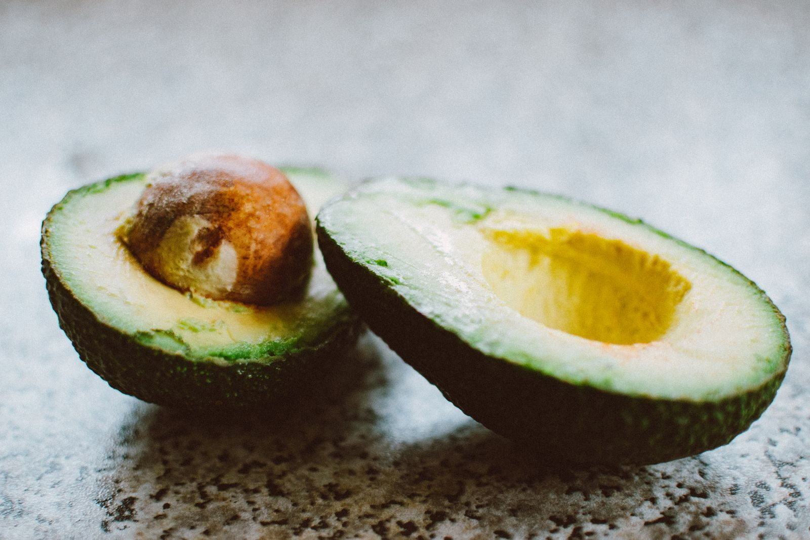 Avocado cut in half, a source of potassium