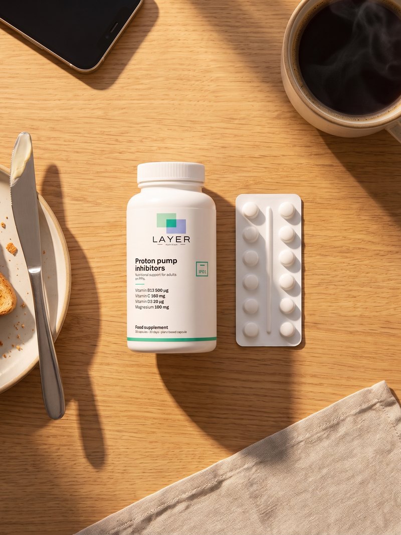 The Layer Nutrition PPI bottle on a breakfast table