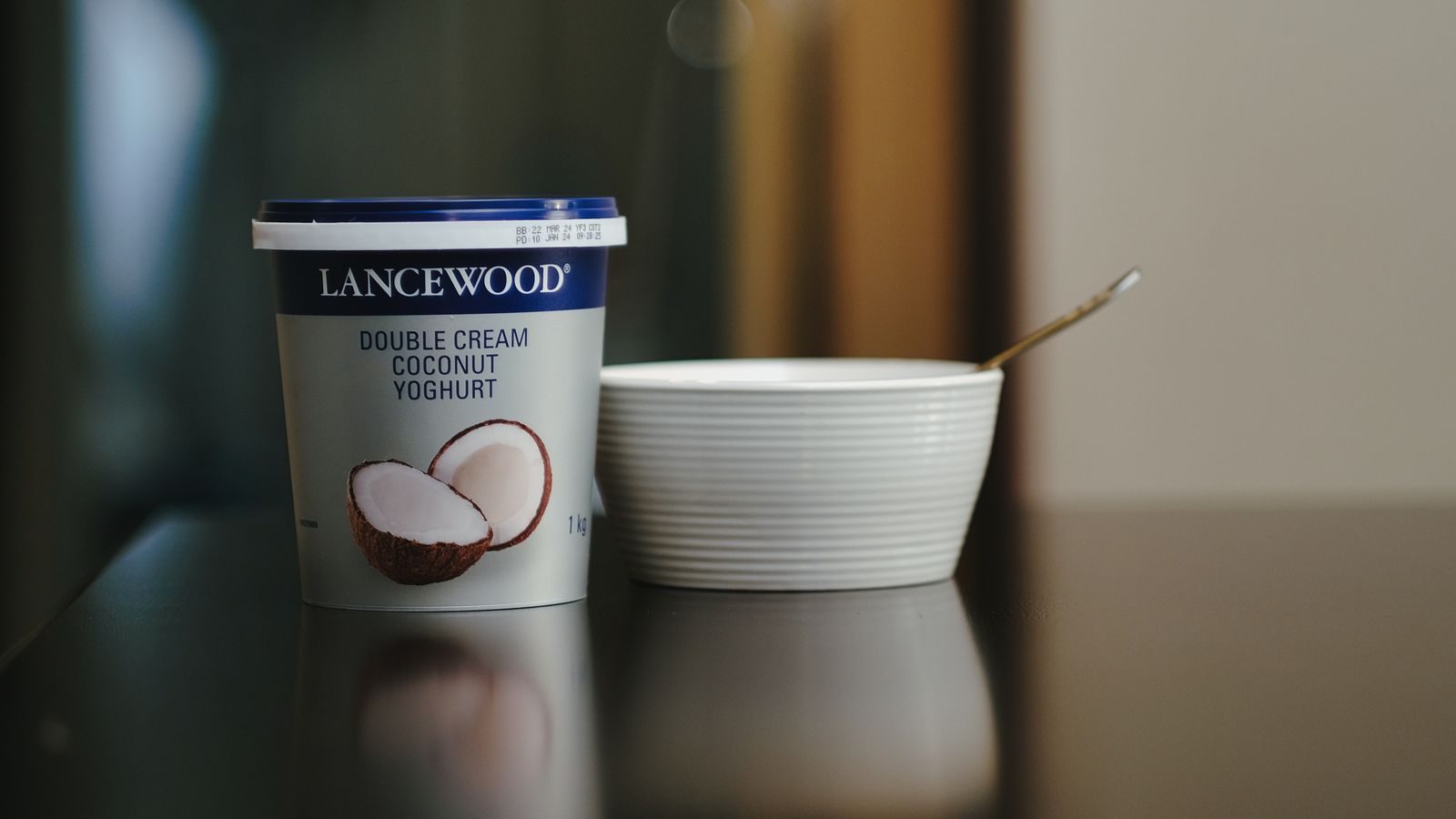 Bowl of plain yoghurt, a source of live cultures